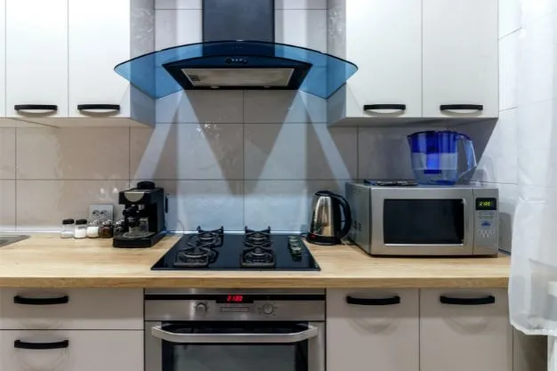 Appliance Integration: Stove, Chimney, and Refrigerators