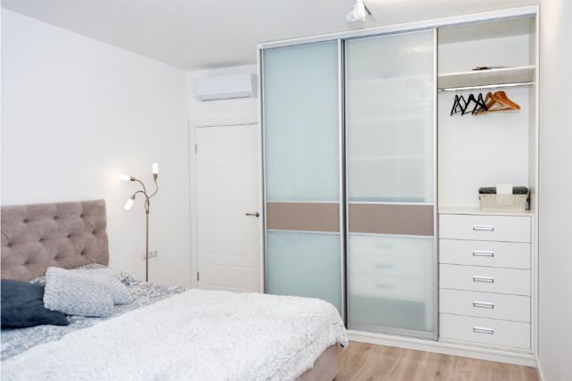 Bedroom with Hinged Cupboard