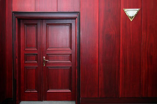 Hues of red for the main door design