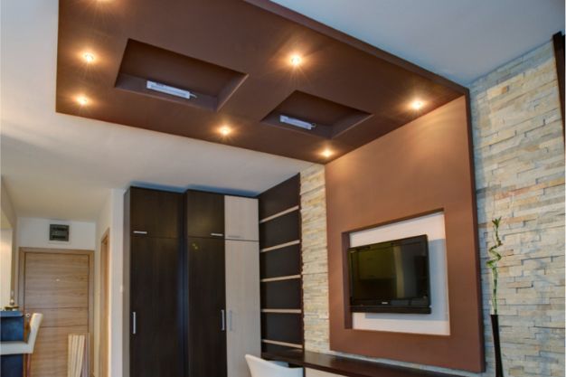 Wooden Accents & Panels in False Ceilings Warmth and Texture for Your Hall
